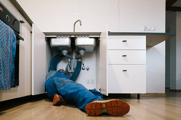Professional Plumbing technician working in Dania, FL